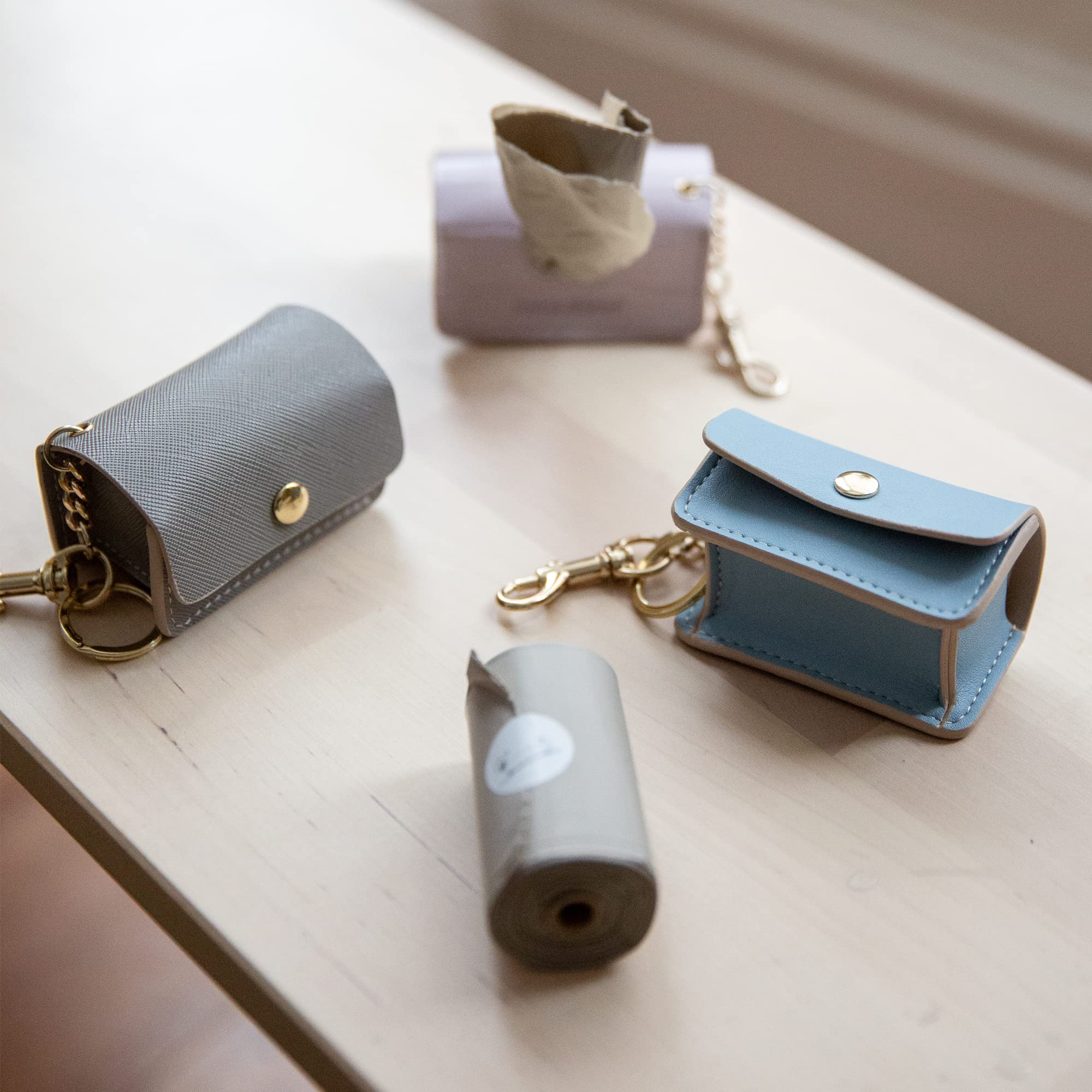 Opciones biodegradables de Nina Woof para el cuidado de mascotas.