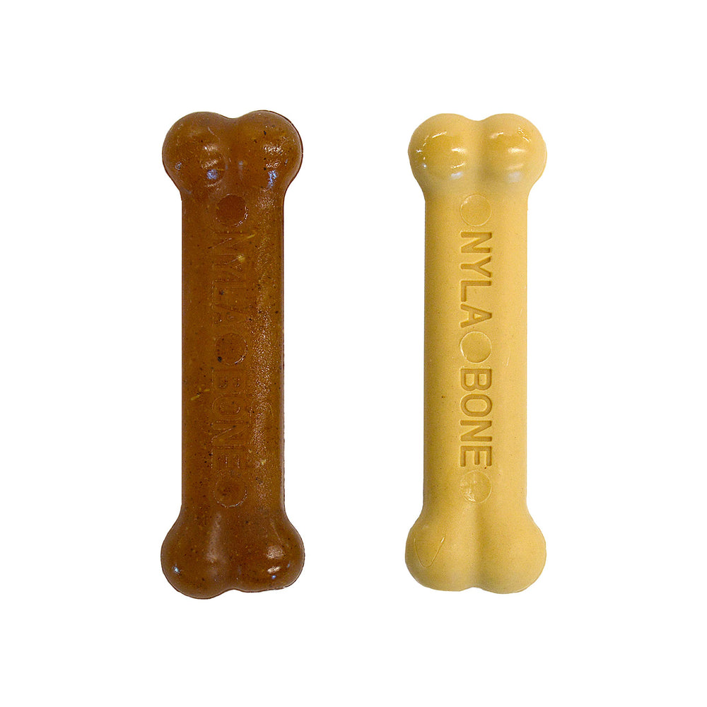 Nylabone Nuevo Cachorro Kit: dos masticables para iniciar dentición suave.