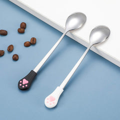 Patelai cuchara inoxidable ergonómica negra, diseño práctico para visitas al plato.