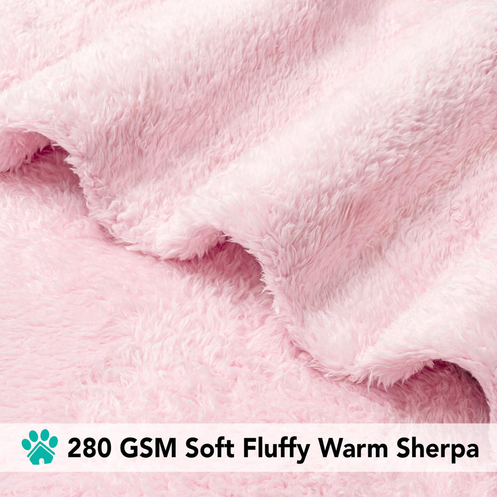 Manta lavable a máquina de PetAmi en rosa, limpieza rápida y sencilla.