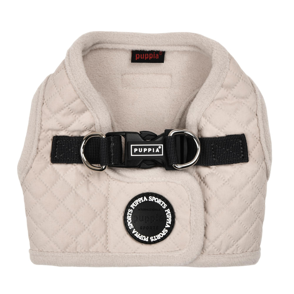 Arnés Puppia Irvin con patrón diamante en crema, ideal para salidas frías.
