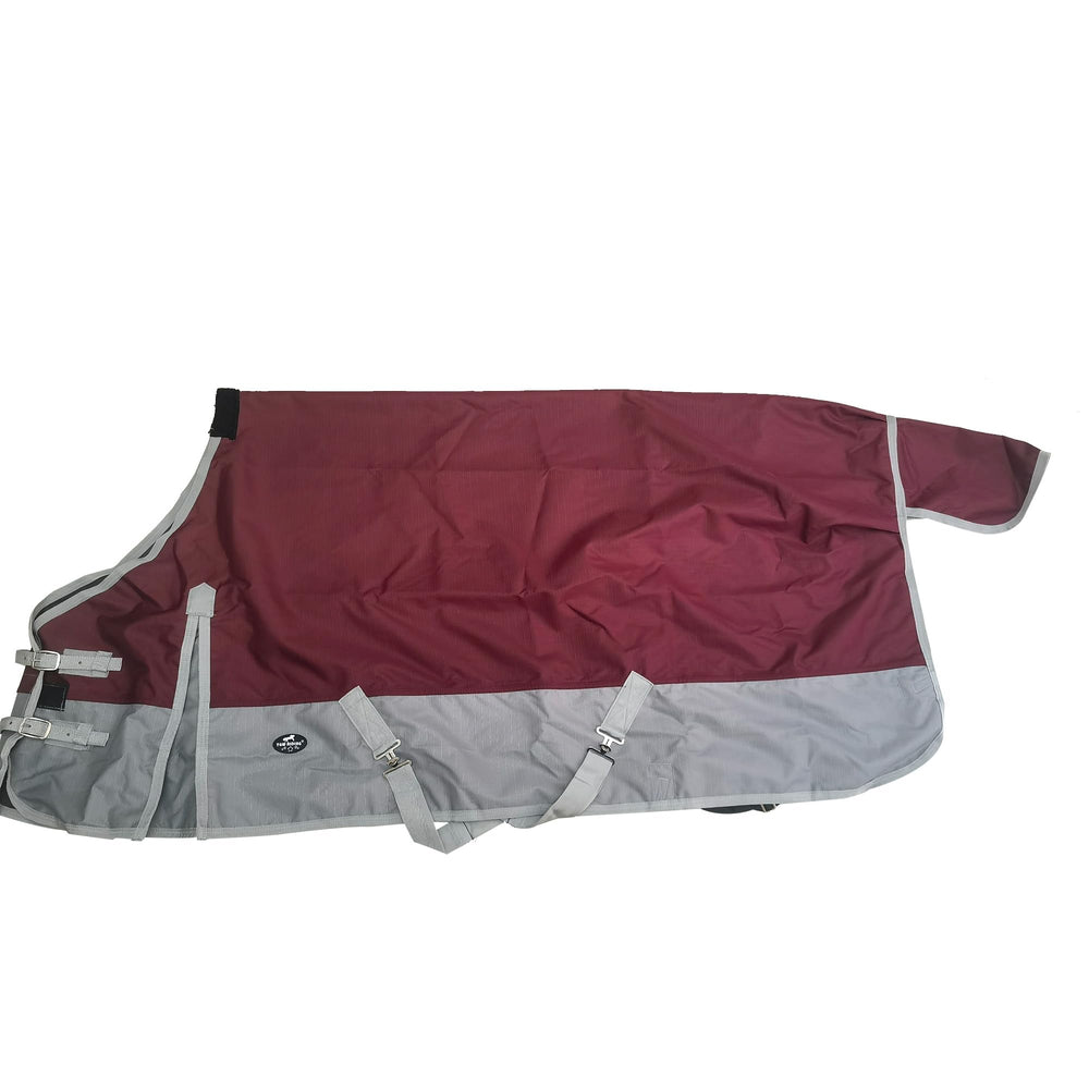 Manta TGW RIDING con correas ajustables de barriga para ajuste seguro.