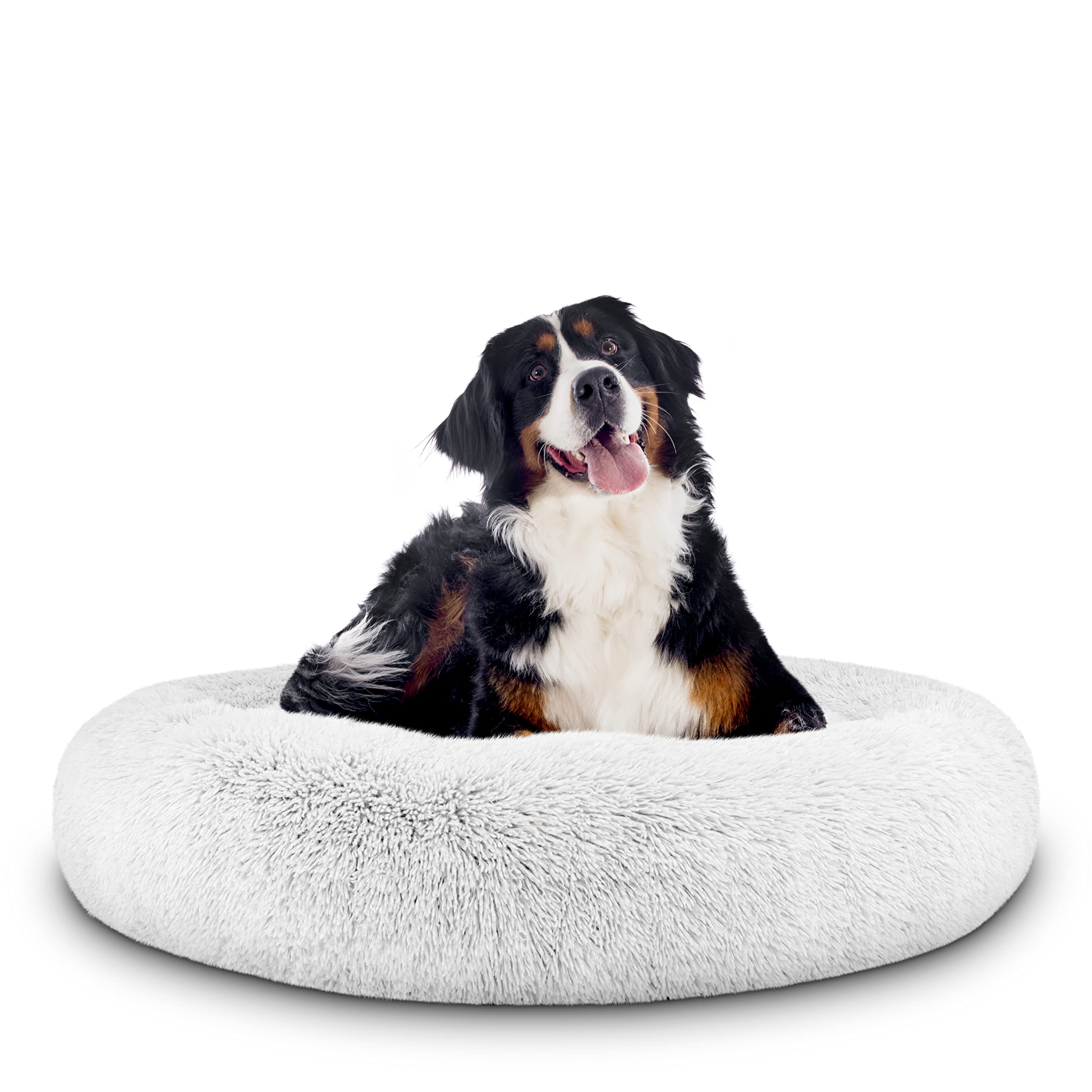 The Dog’s Balls cama rosquilla nido de peluche blanco para descanso cómodo.