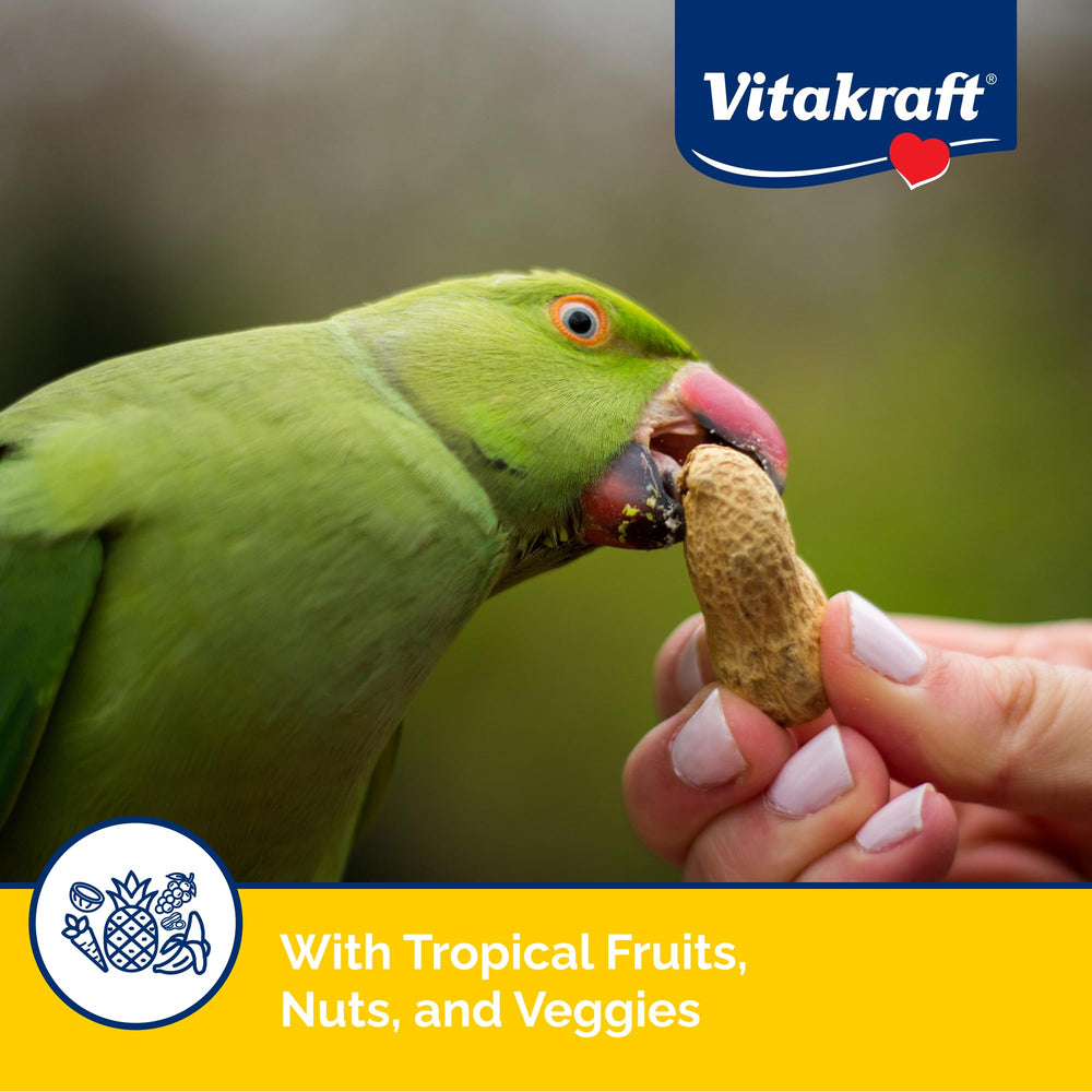 Vitakraft Cóctel de Frutas: mezcla de frutas, nueces y vegetales para snack equilibrado.