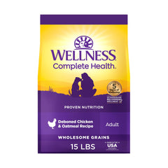 Wellness Complete Health, bolsa de 15 libras con croquetas de pollo y avena para nutrición diaria.