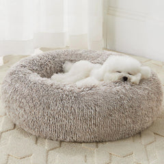 Cama donut WNPETHOME para perros pequeños, confort y descanso profundo.