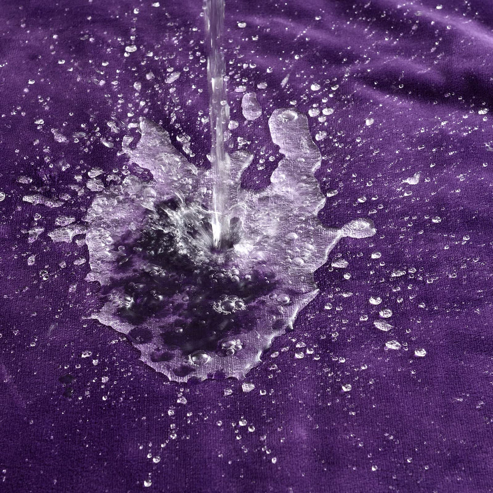 Manta Yaning color púrpura oscuro para cama y sofá.