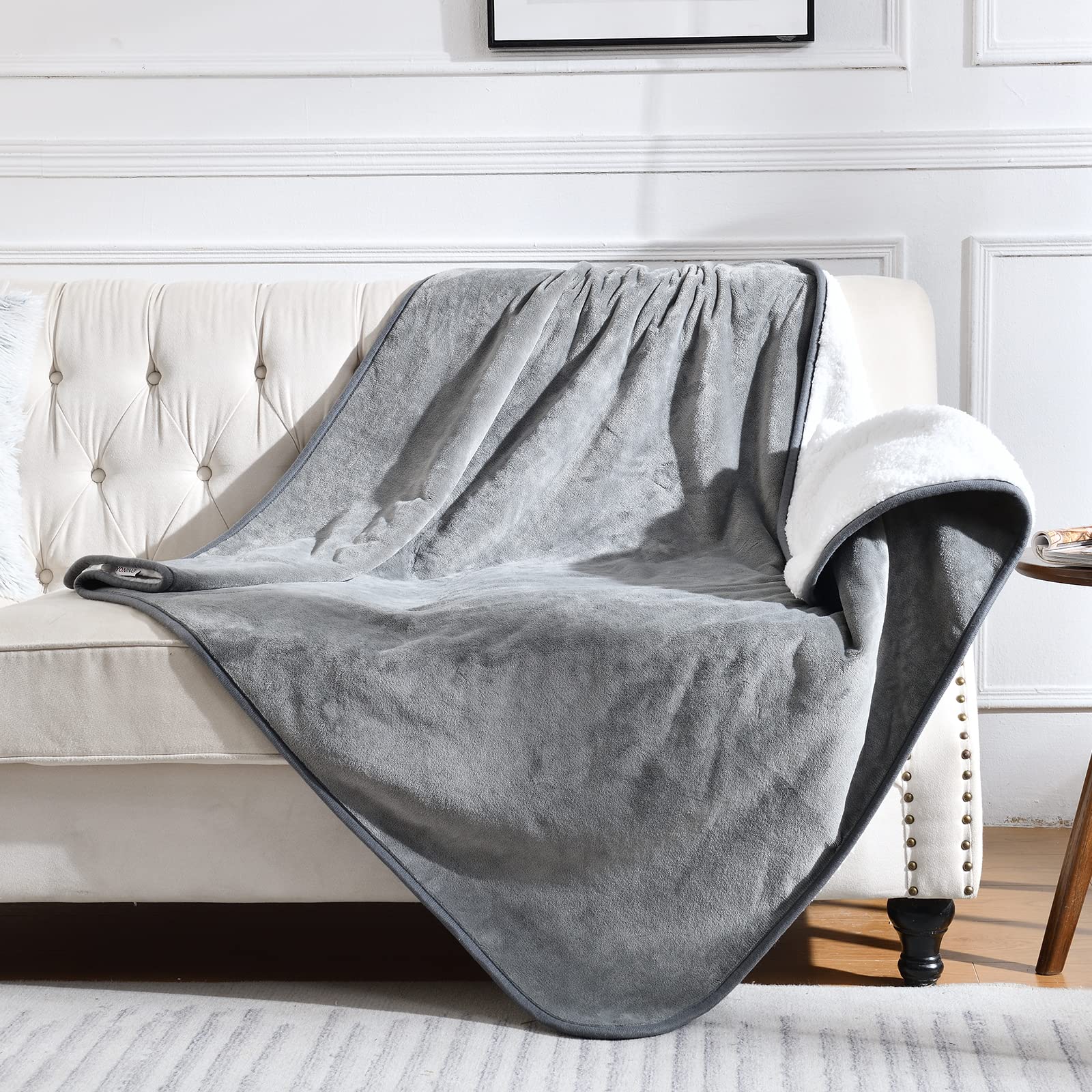 Manta Yaning impermeable dos caras protege cama y sofá ante derrames.