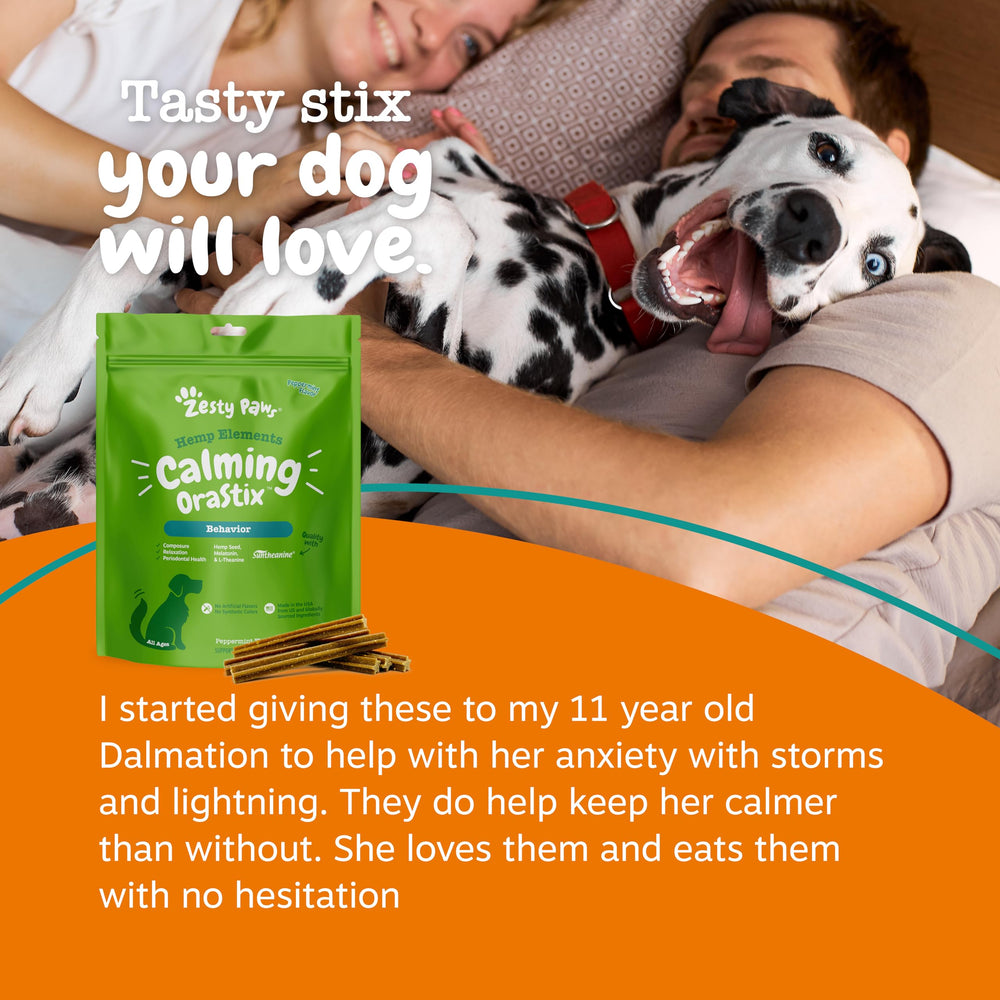 Zesty Paws OraStix dog chewing sticks shown in use